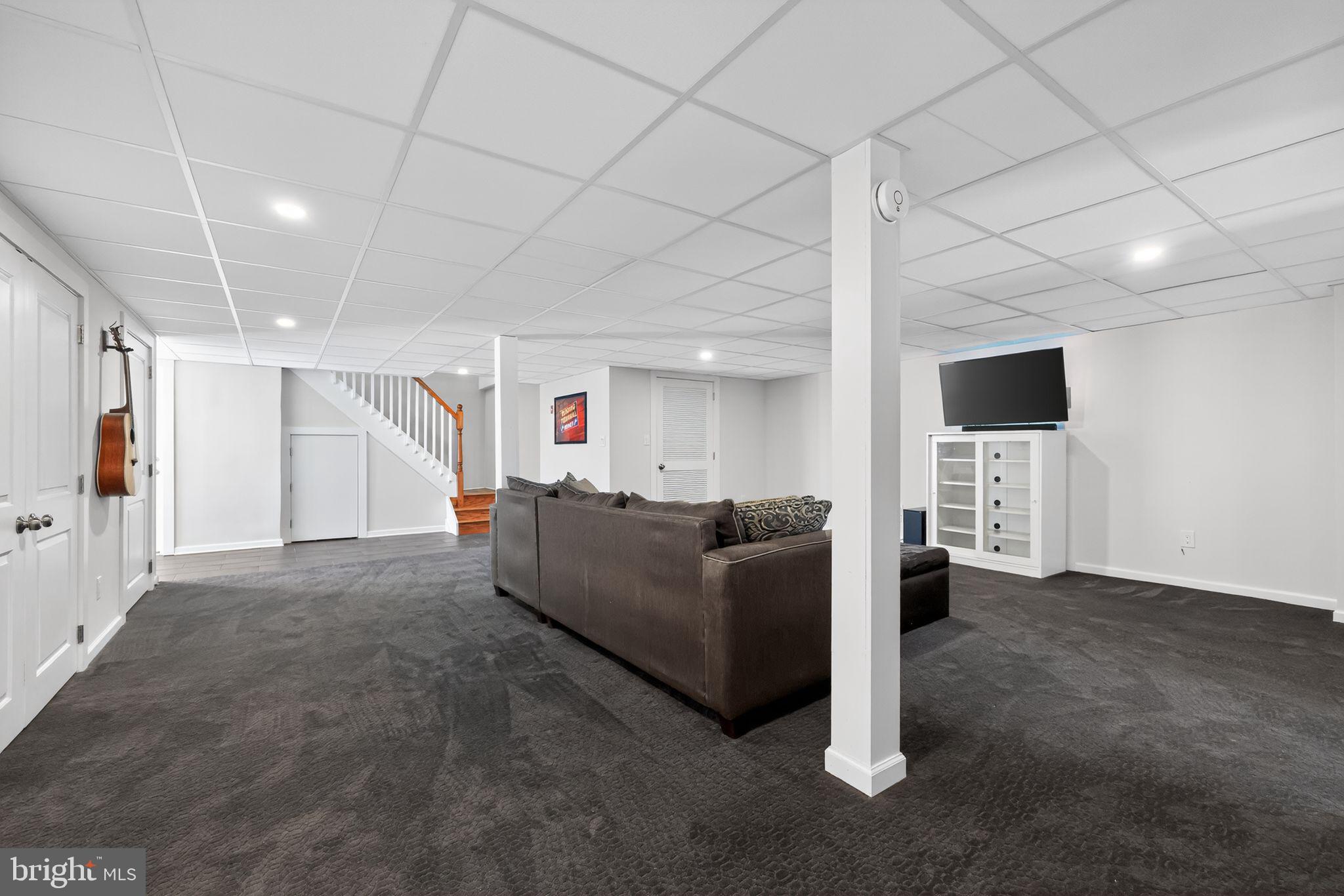 711 Brookhaven Road Wallingford, PA 19086 - Photo 25 of 35 a living room with furniture and a flat screen tv