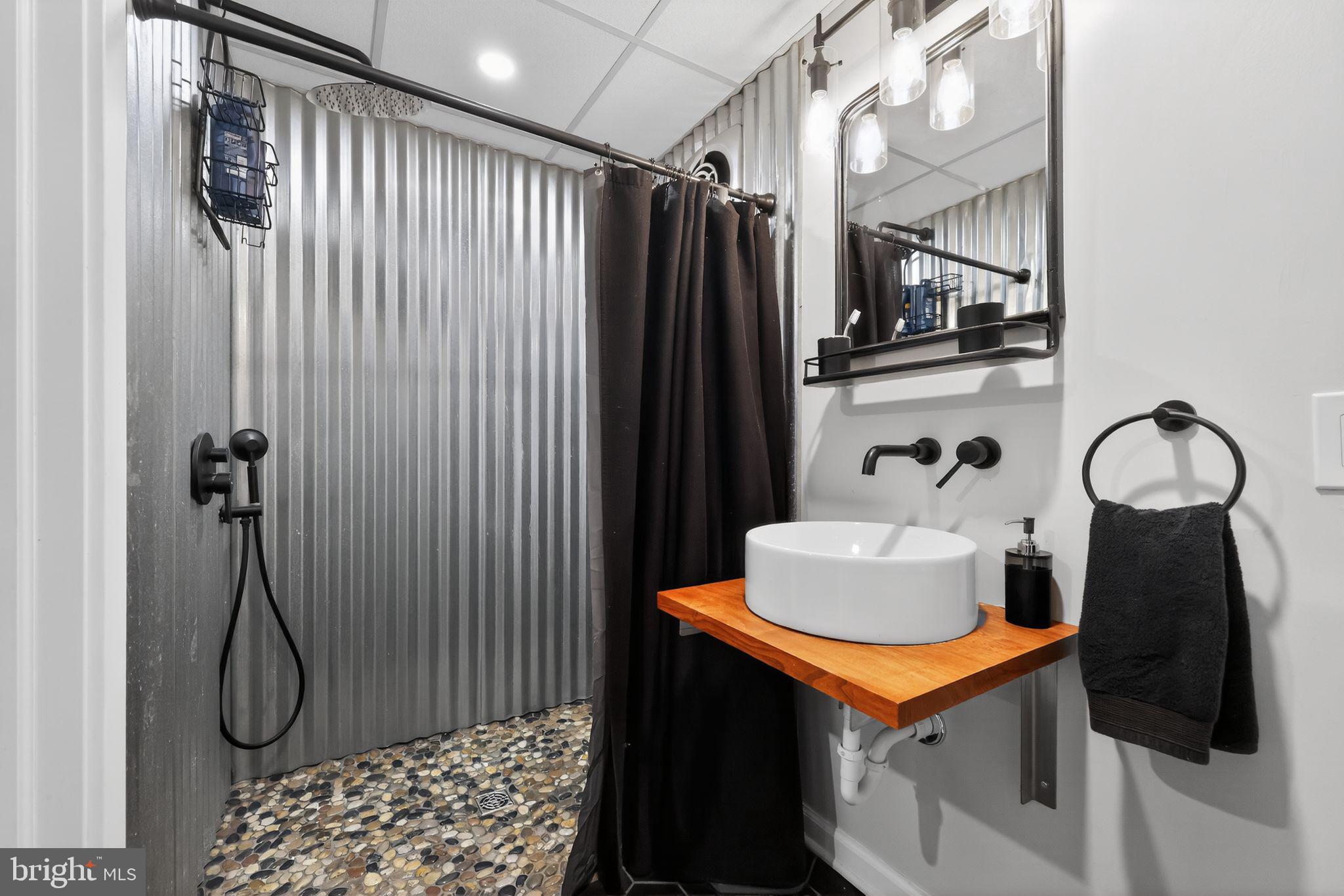 711 Brookhaven Road Wallingford, PA 19086 - Photo 29 of 35 a bathroom with a sink toilet and shower