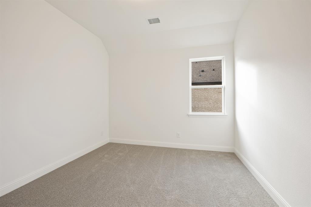 735 Oak Lavon, TX 75166 - Photo 14 of 39 an empty room with a window