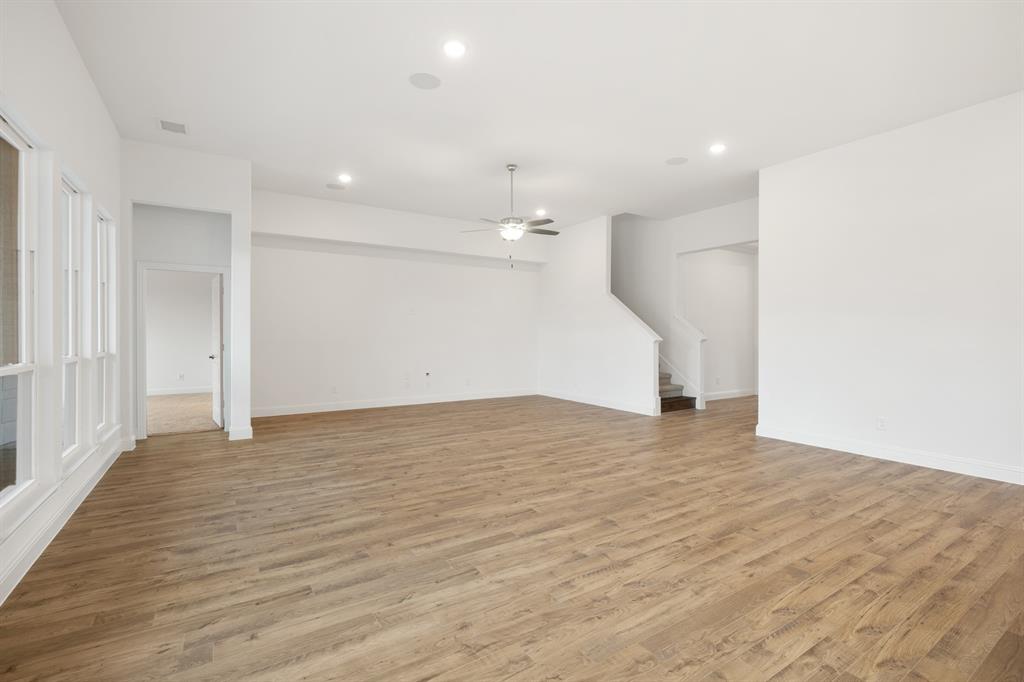 735 Oak Lavon, TX 75166 - Photo 24 of 39 a view of an empty room with wooden floor