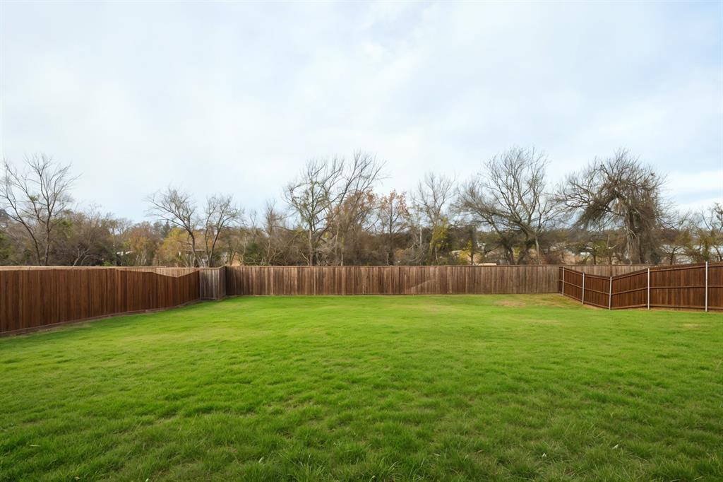 735 Oak Lavon, TX 75166 - Photo 39 of 39 a view of a field of grass and trees