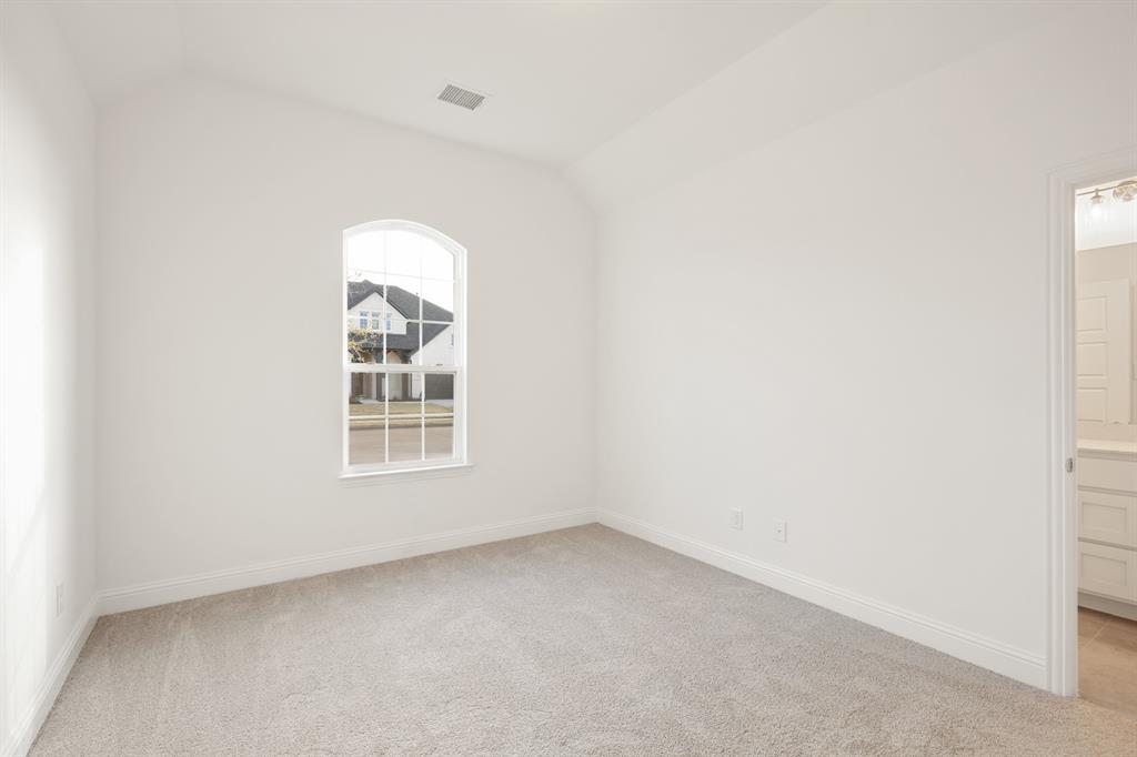 735 Oak Lavon, TX 75166 - Photo 4 of 39 a view of a window in an empty room