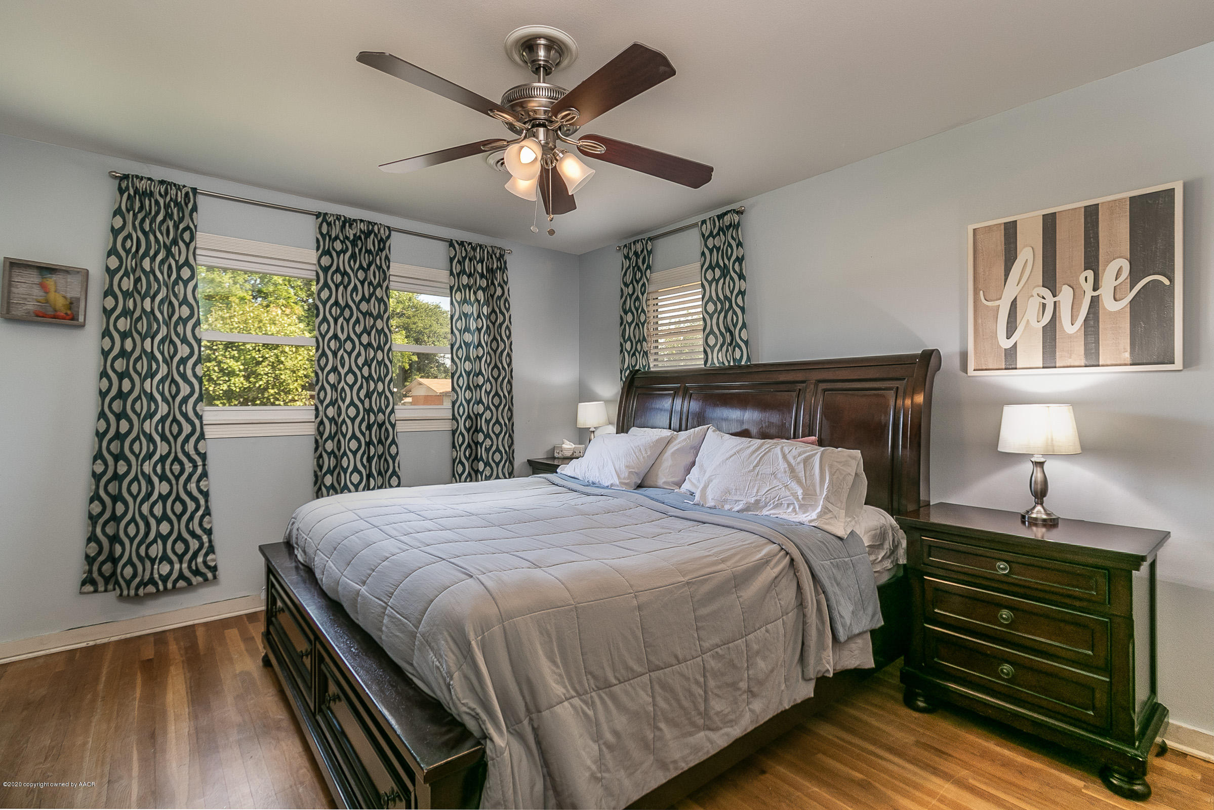 4709 South Austin Street Amarillo, TX 79110 - Photo 11 of 22 a bedroom with a bed and a window