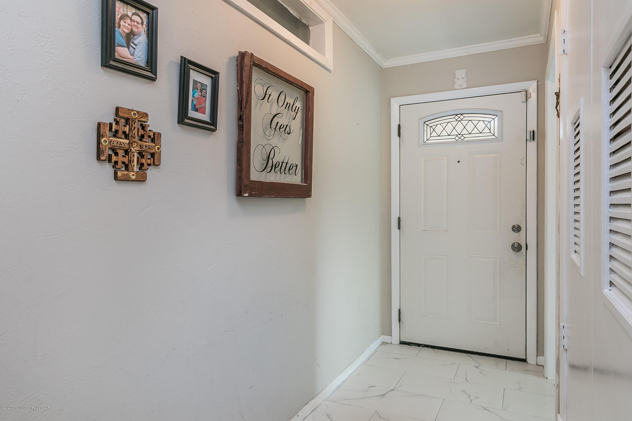 4709 South Austin Street Amarillo, TX 79110 - Photo 3 of 22 a view of a hallway with front door