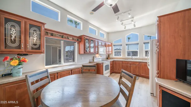 a kitchen with stainless steel appliances granite countertop a stove and a sink