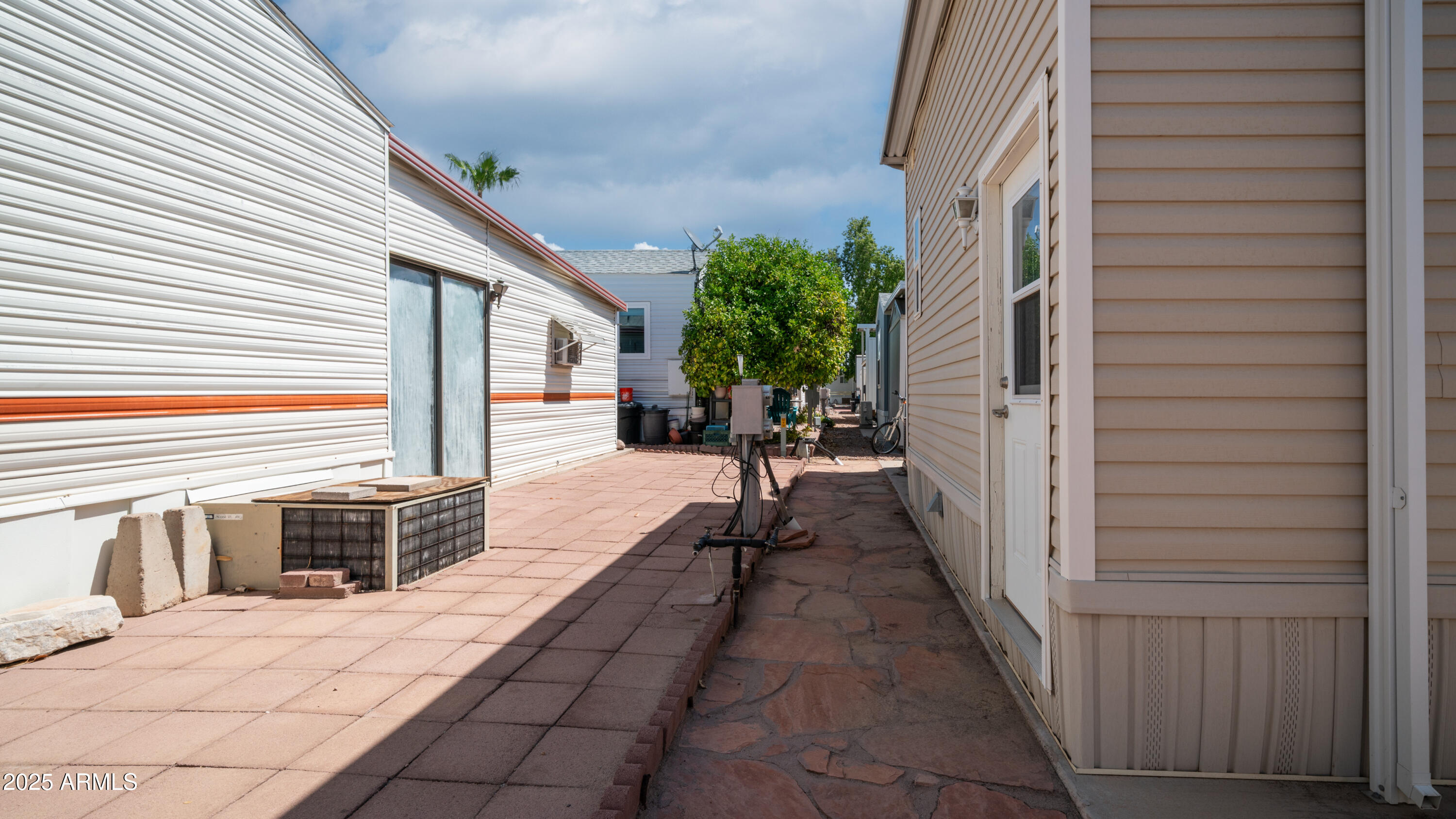 2400 East Baseline Avenue Apache Junction, AZ 85119 - Photo 29 of 64 a view of a balcony with chairs and stairs