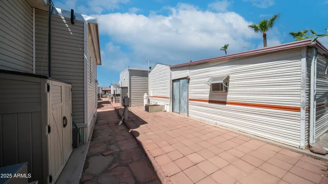 a view of a terrace with furniture and stove