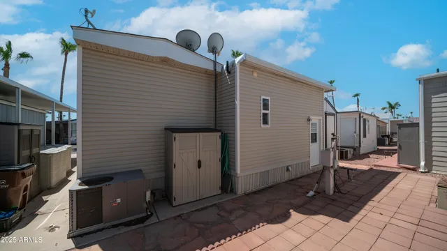 a swimming pool with outdoor seating and deck view