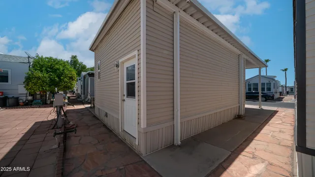 a view of a backyard with a patio
