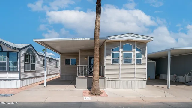 a front view of a house with garage