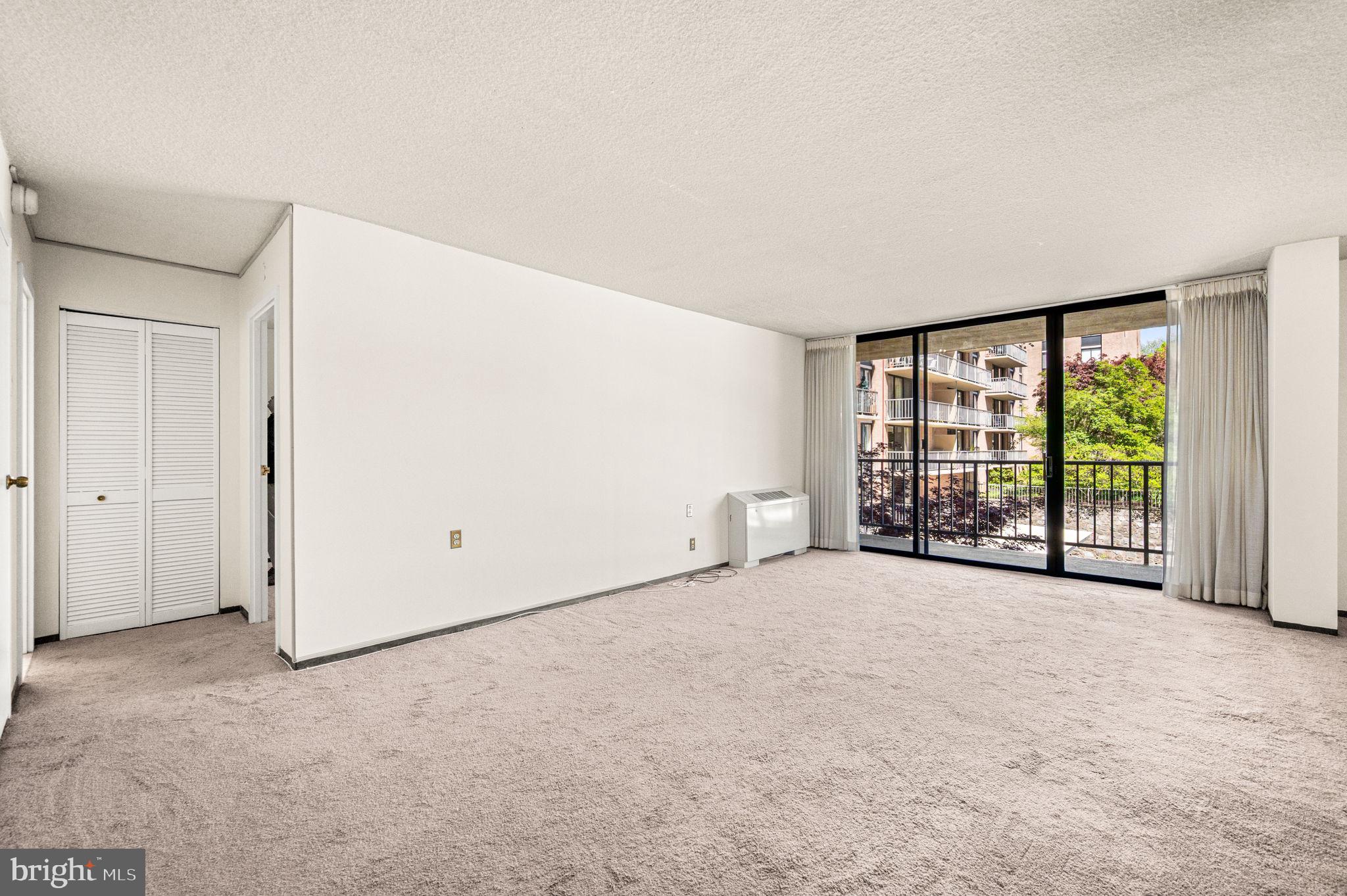801 Yale Avenue, Unit 511 Swarthmore, PA 19081 - Photo 2 of 28 Ample living room with bathed in natural light.