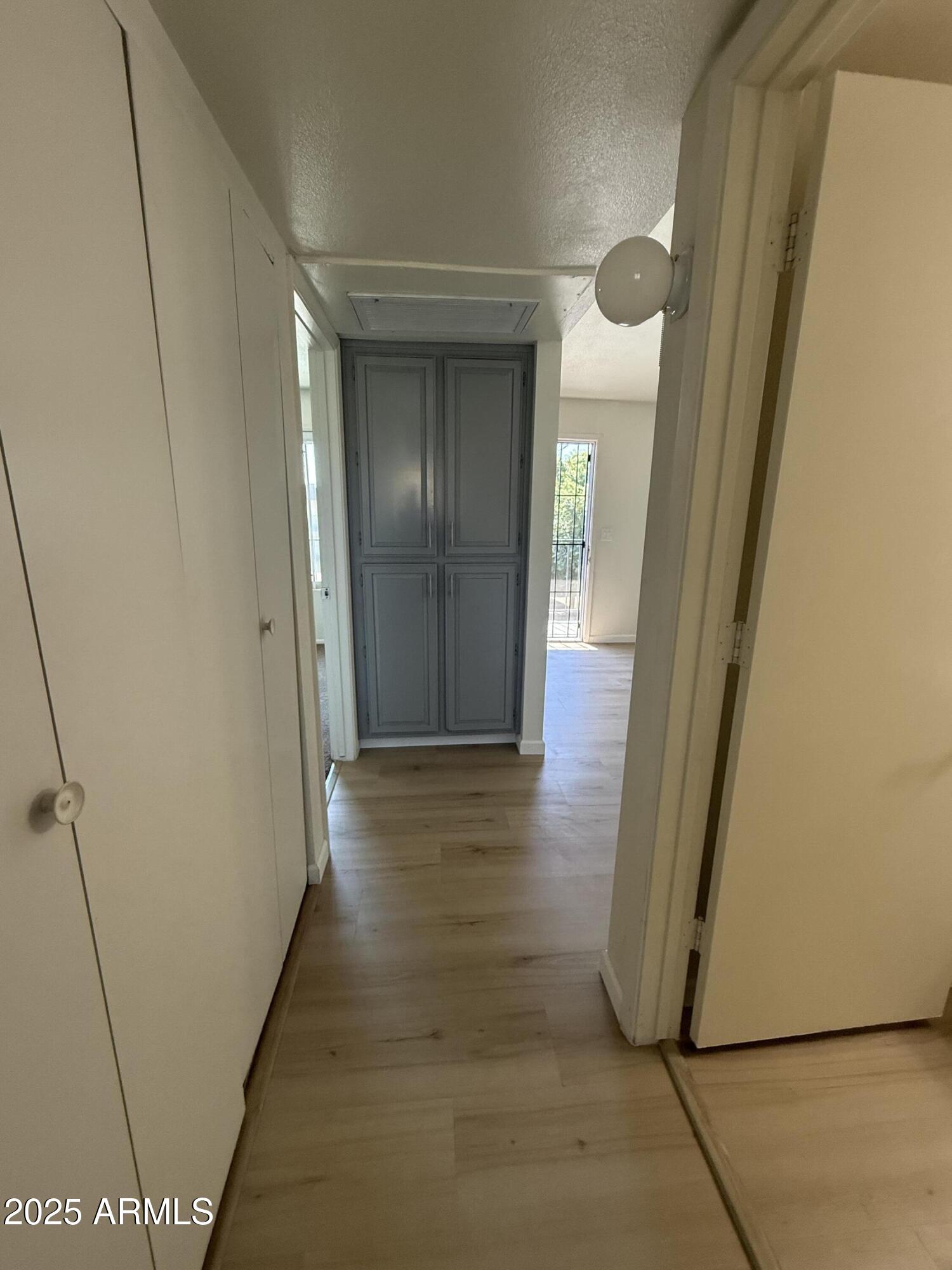 461 West Holmes Avenue, Unit 342 Mesa, AZ 85210 - Photo 15 of 21 a view of a hallway