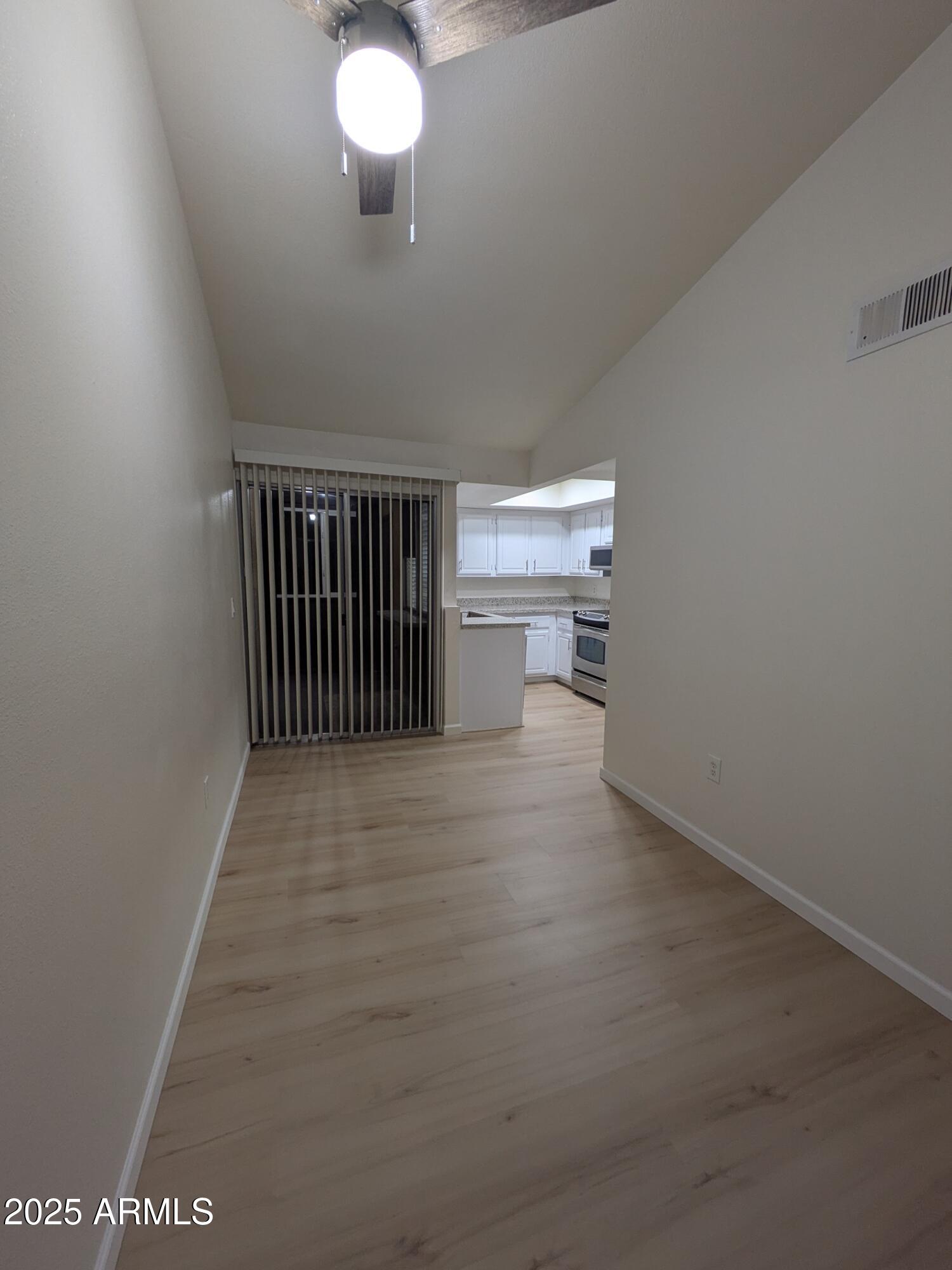 461 West Holmes Avenue, Unit 342 Mesa, AZ 85210 - Photo 20 of 21 a view of a livingroom with a chair