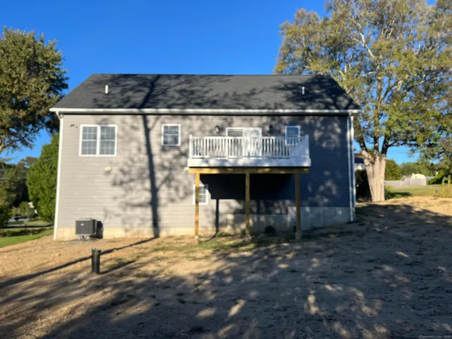 a front view of a house with parking space