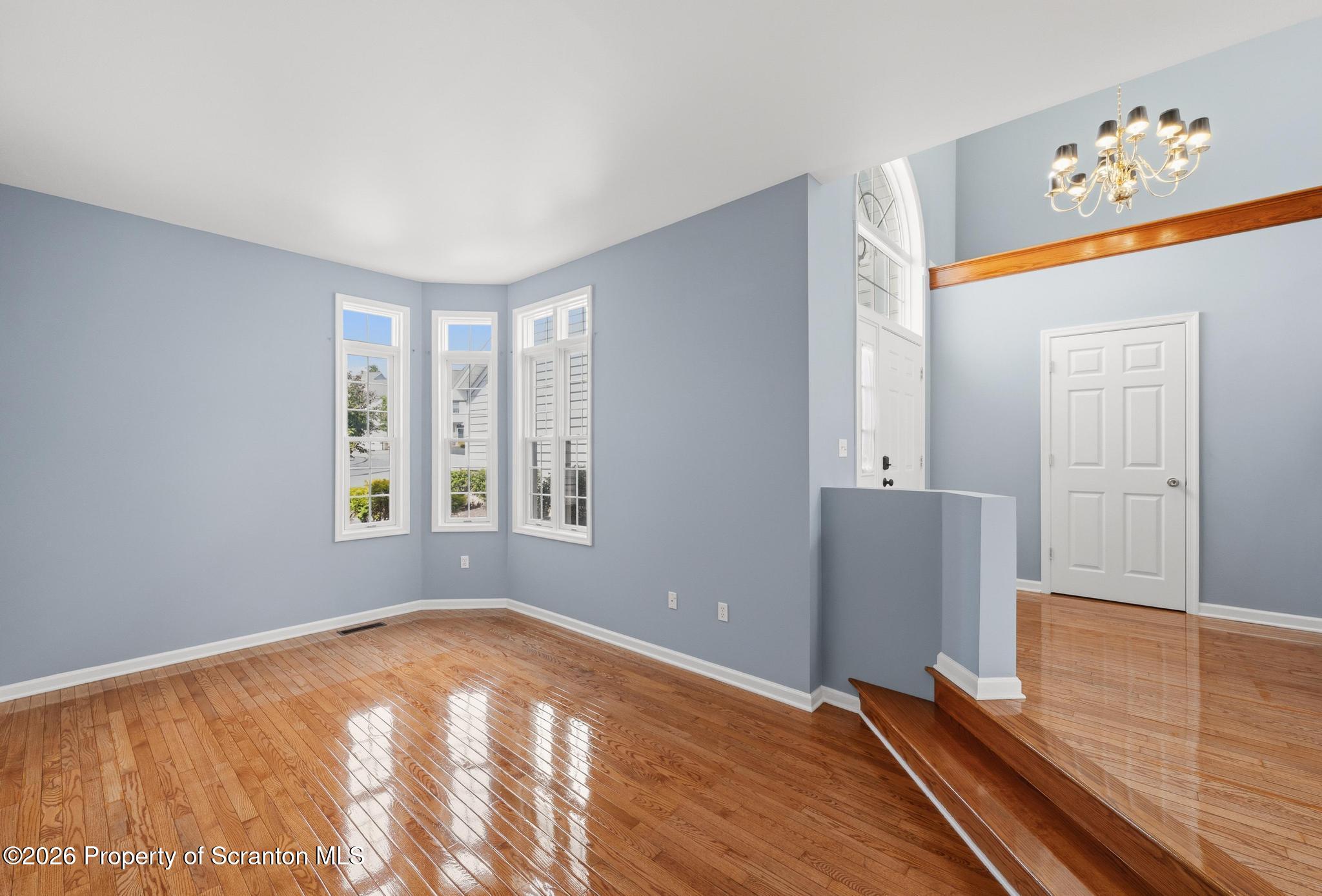 1502 Verne Cl Moosic, PA 18507 - Photo 15 of 46 a view of an empty room with window and wooden floor