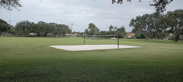a view of a golf course with a lake