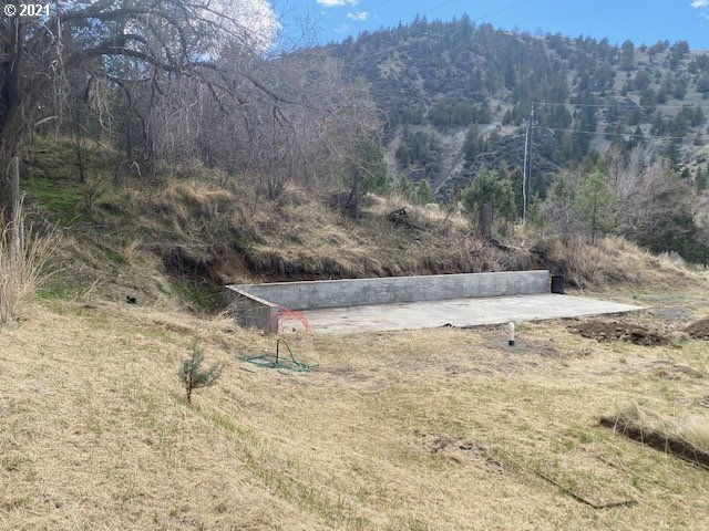 26531 Nelson Road Canyon City, OR 97820 - Photo 2 of 8 a view of a yard with trees