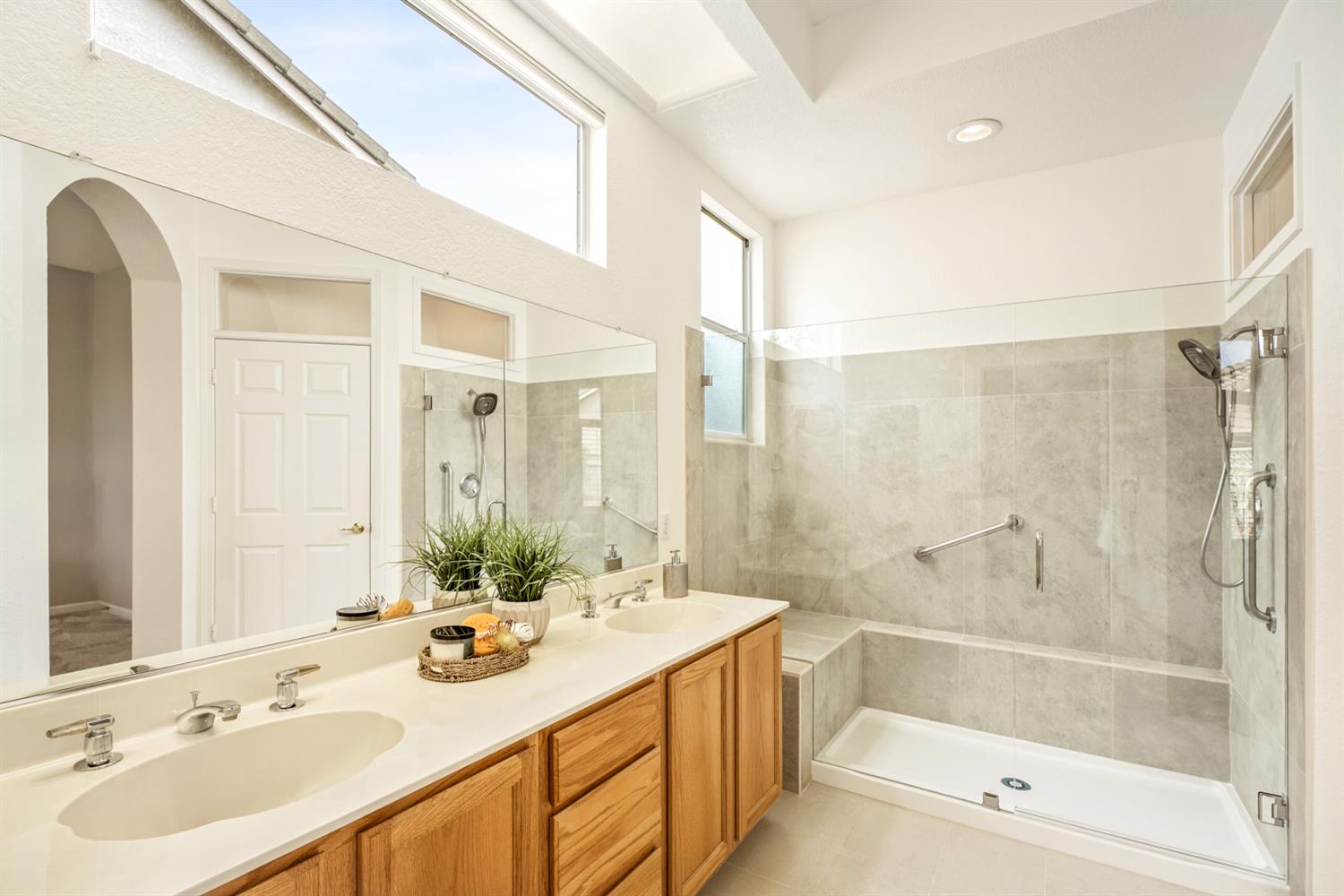4081 Rose Creek Road Roseville, CA 95747 - Photo 28 of 52 a bathroom with a bathtub shower sink vanity and toilet