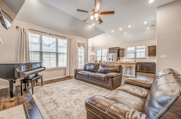 a living room with furniture and a couch