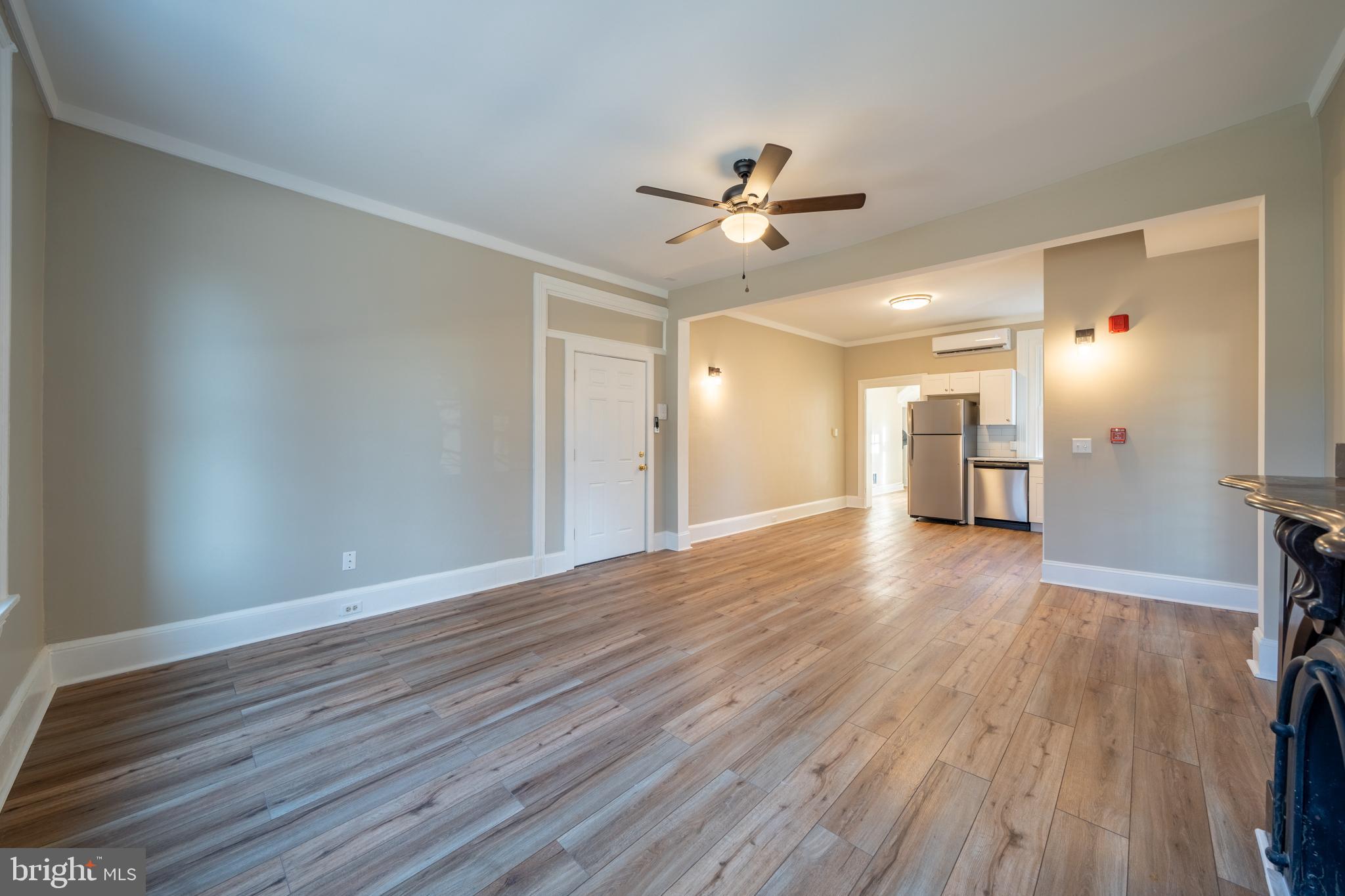 327 North High Street, Unit 1 West Chester, PA 19380 - Photo 3 of 13 a view of an empty room with a window