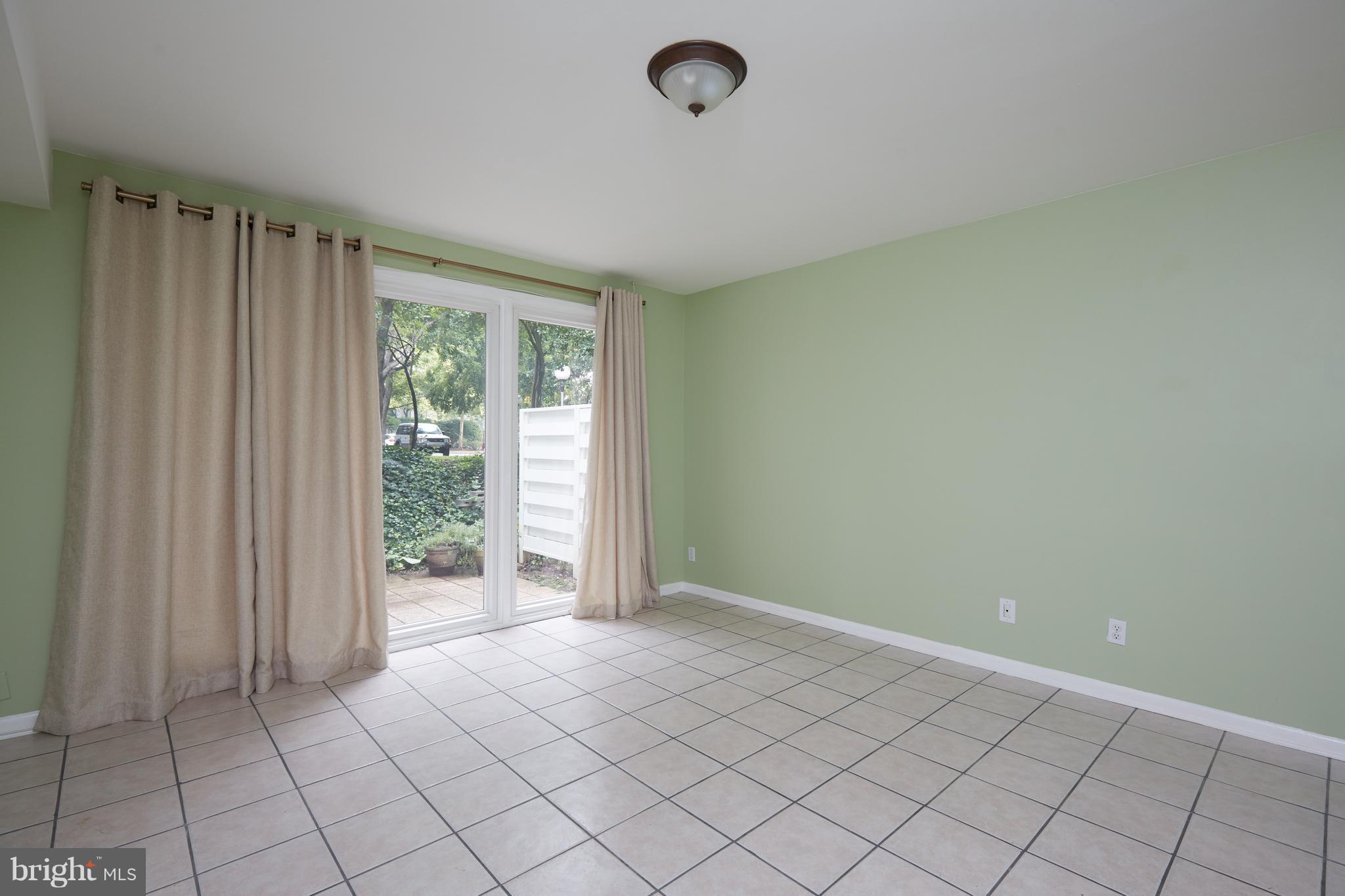 108 G Street Southwest, Unit 105 Washington, DC 20024 - Photo 18 of 25 Rec Room / Walk Out Level Bedroom