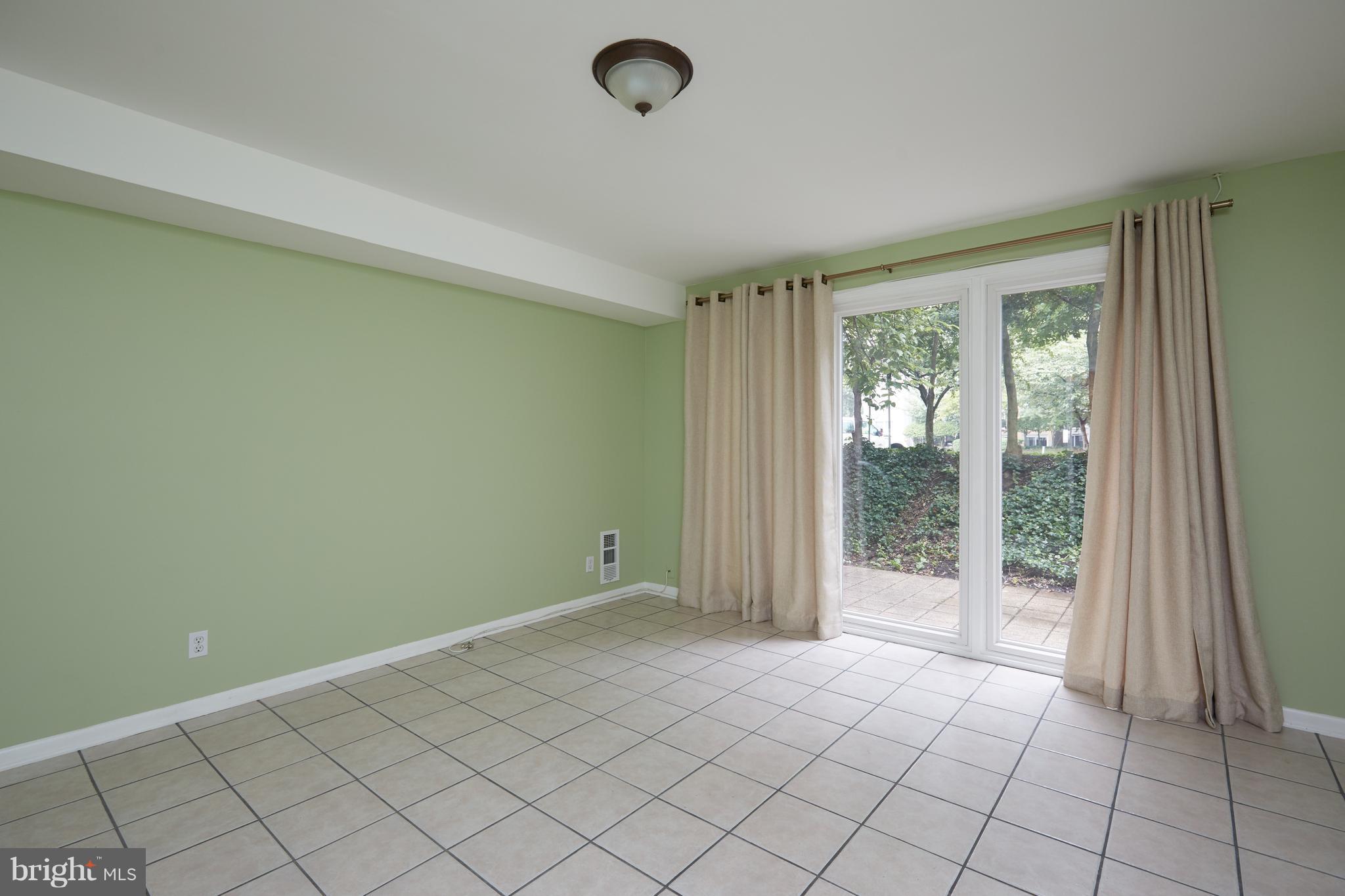108 G Street Southwest, Unit 105 Washington, DC 20024 - Photo 19 of 25 Rec Room / Walk Out Level Bedroom