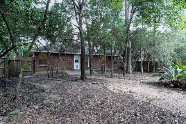a backyard of a house with lots of green space