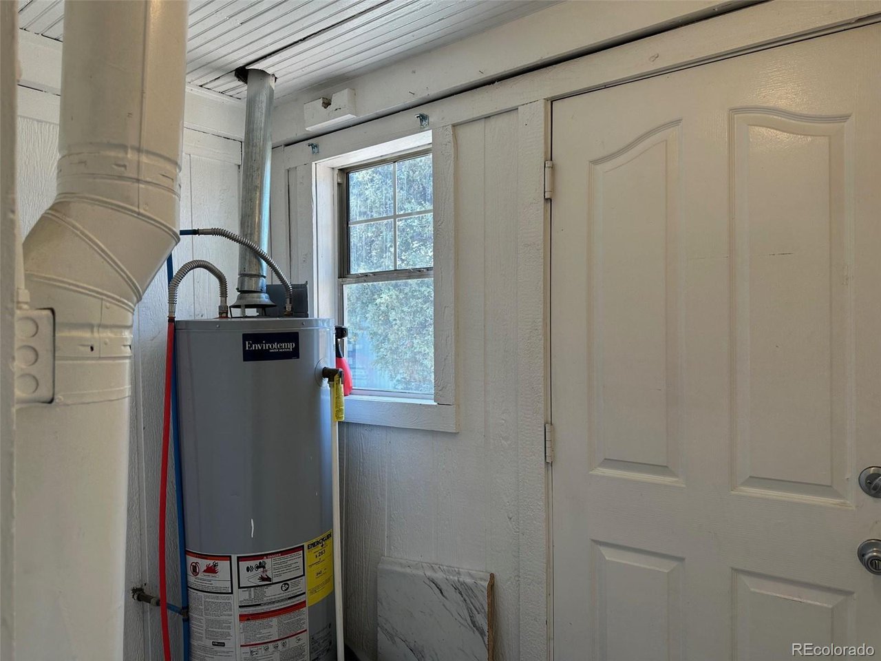 4701 Sherman Street Denver, CO 80216 - Photo 12 of 23 4703 Utility room