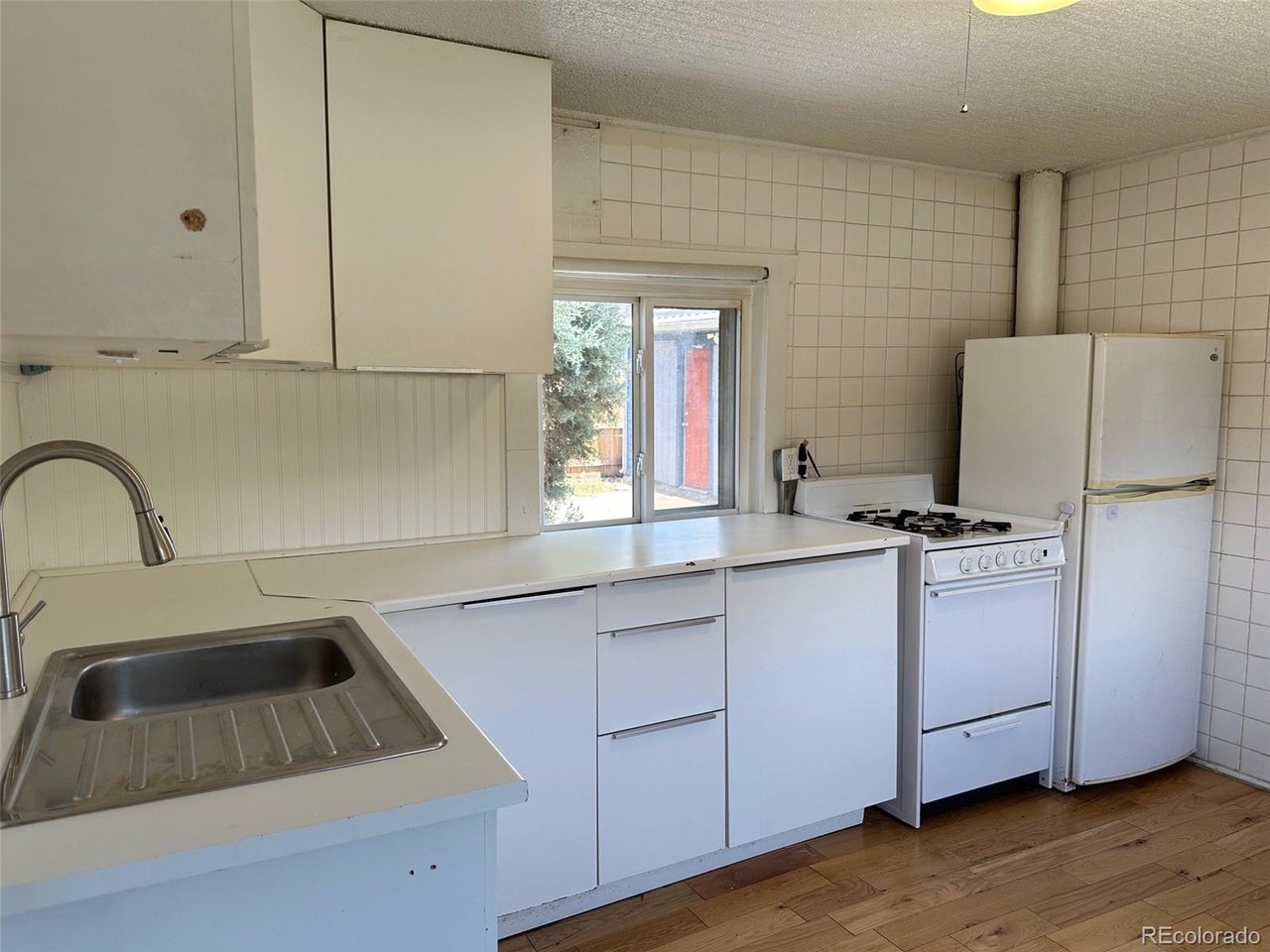 4701 Sherman Street Denver, CO 80216 - Photo 15 of 23 4701 Kitchen