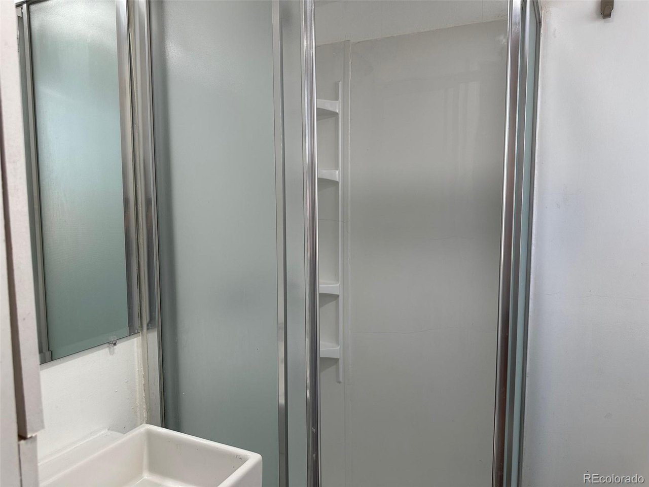 4701 Sherman Street Denver, CO 80216 - Photo 10 of 23 4703 Bathroom