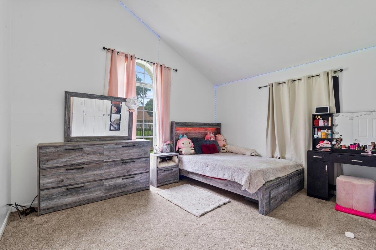 5841 Foxdale Road Memphis, TN 38115 - Photo 18 of 21 a bedroom with a bed and a window