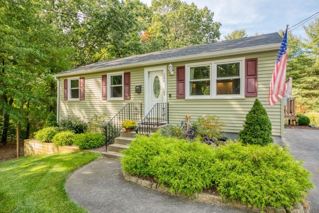 136 Webber Street Springfield, MA 01108 - Photo 1 of 29 a front view of a house with garden