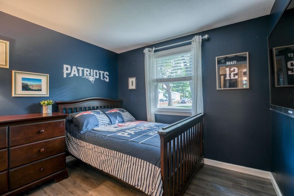 136 Webber Street Springfield, MA 01108 - Photo 17 of 29 a bedroom with a bed and a window
