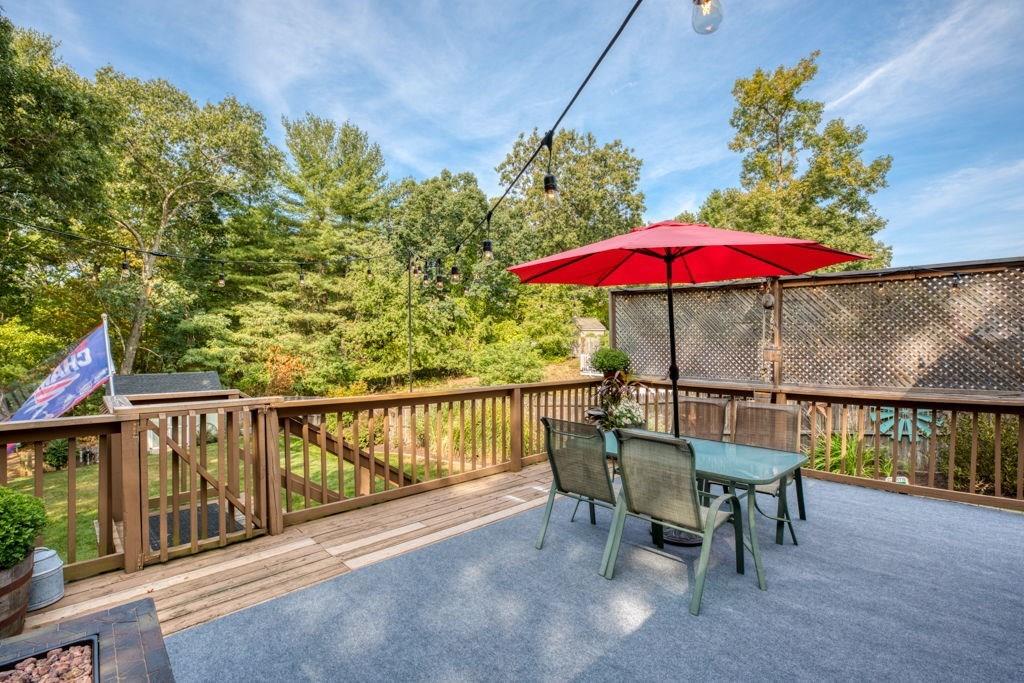 136 Webber Street Springfield, MA 01108 - Photo 26 of 29 a view of a deck with furniture and a yard