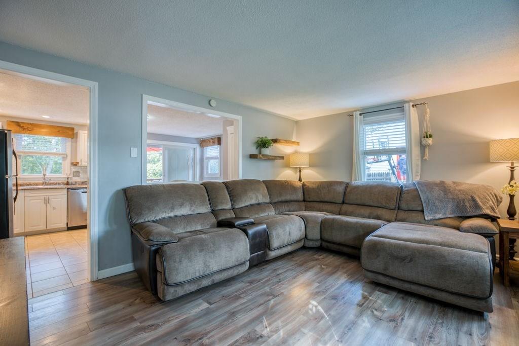 136 Webber Street Springfield, MA 01108 - Photo 9 of 29 a living room with furniture and a wooden floor