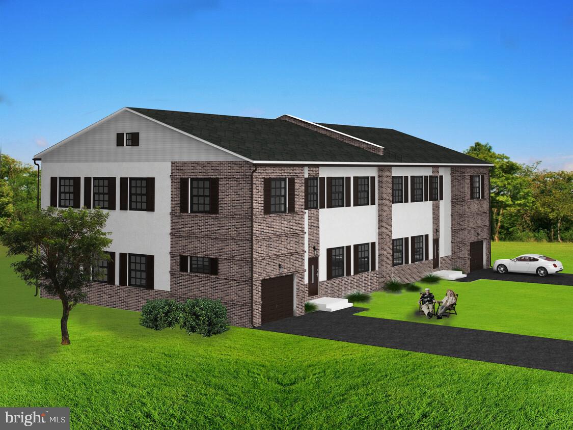 130 East Street Road Warminster, PA 18974 - Photo 4 of 6 a front view of a house with a yard