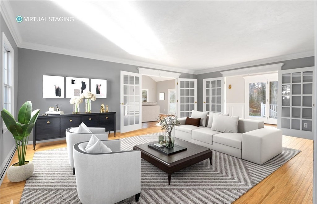 1 Huckleberry Hill Lane Hingham, MA 02043 - Photo 1 of 30 a living room with furniture and a potted plant