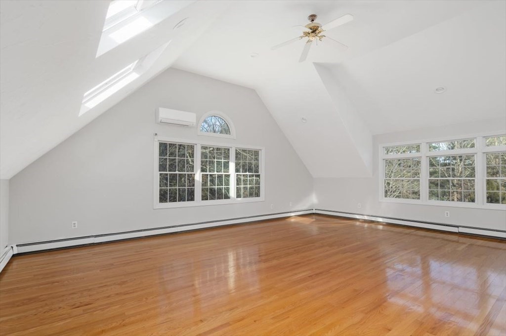 1 Huckleberry Hill Lane Hingham, MA 02043 - Photo 23 of 30 wooden floor in an empty room with a window