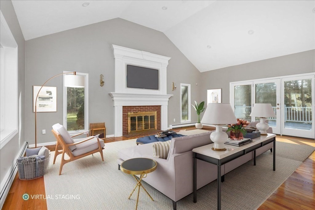 1 Huckleberry Hill Lane Hingham, MA 02043 - Photo 6 of 30 a living room with furniture fireplace and a table
