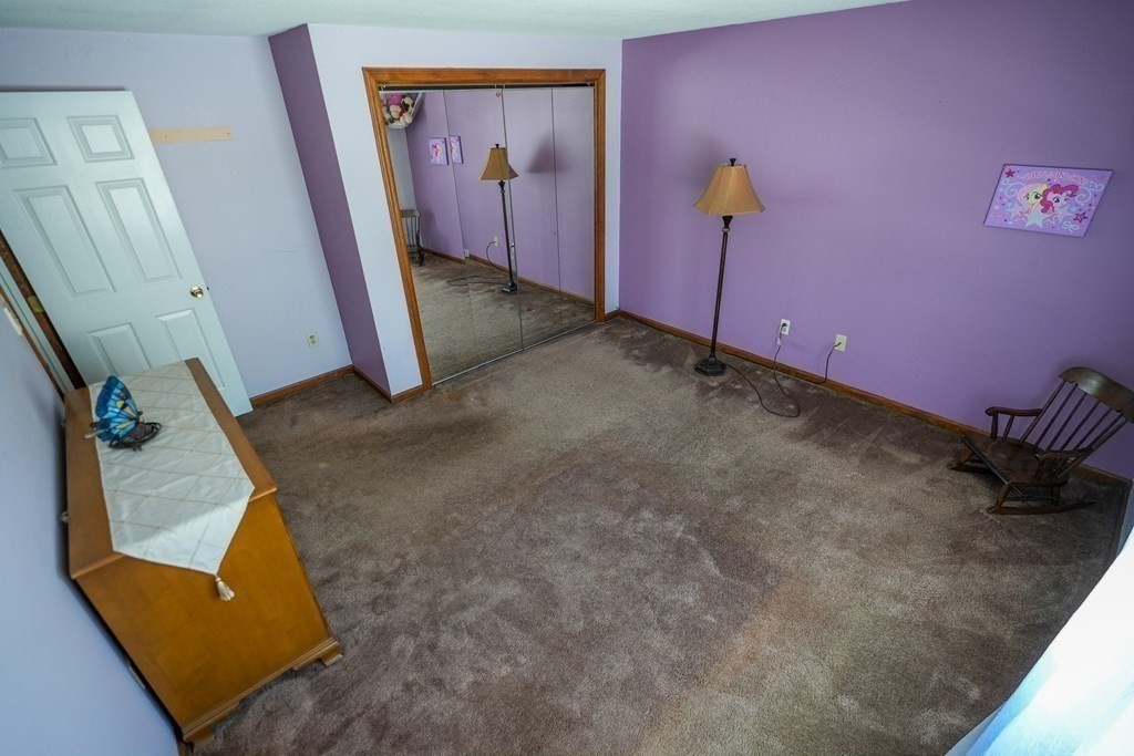 283 Fuller Road, Unit E Chicopee, MA 01020 - Photo 13 of 21 a view of a room with gym equipment
