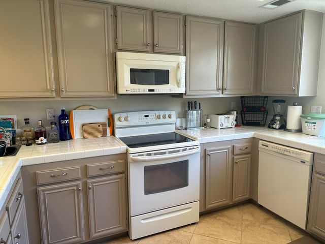 a kitchen with a sink and a window
