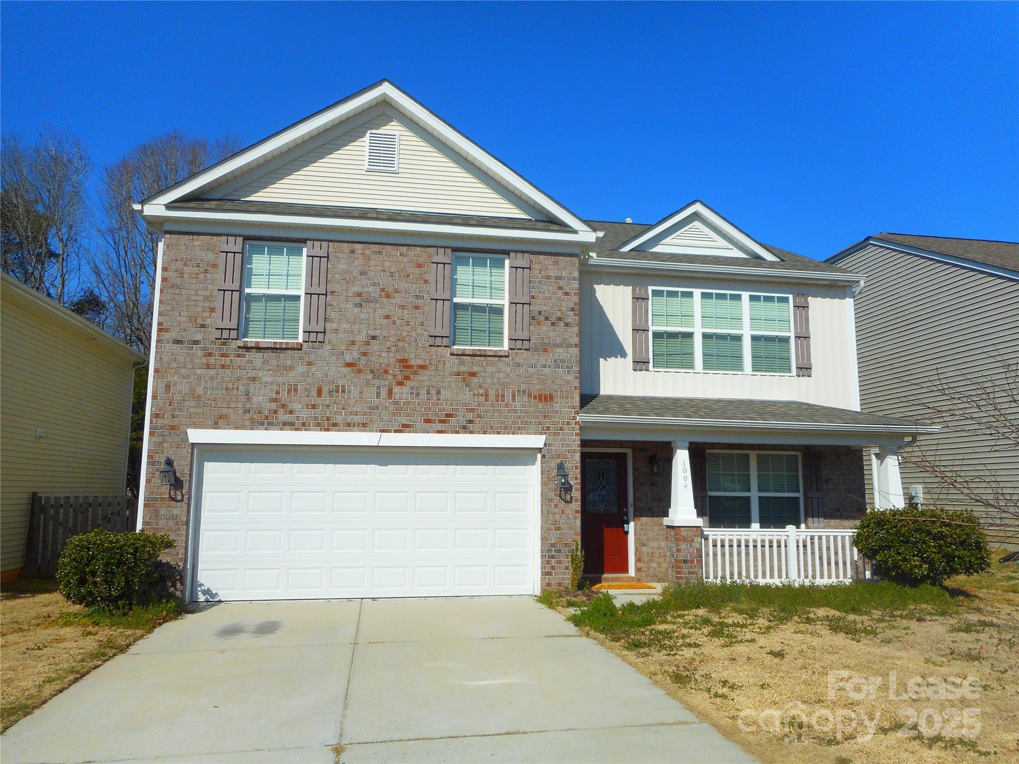 1004 Marcus Street Indian Land, SC 29707 - Photo 1 of 26 a front view of a house with garden