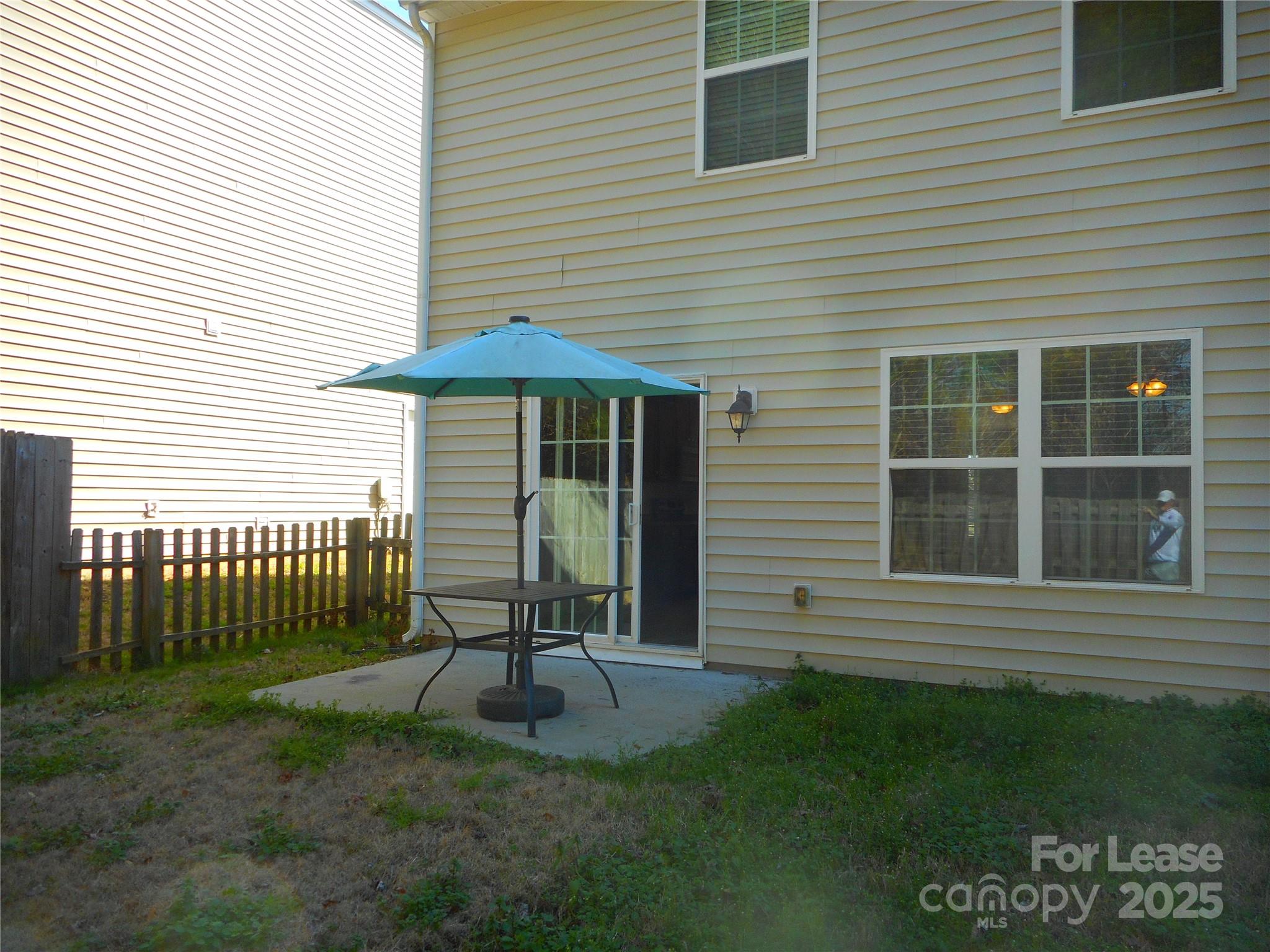 1004 Marcus Street Indian Land, SC 29707 - Photo 14 of 26 a front view of a house with a garden