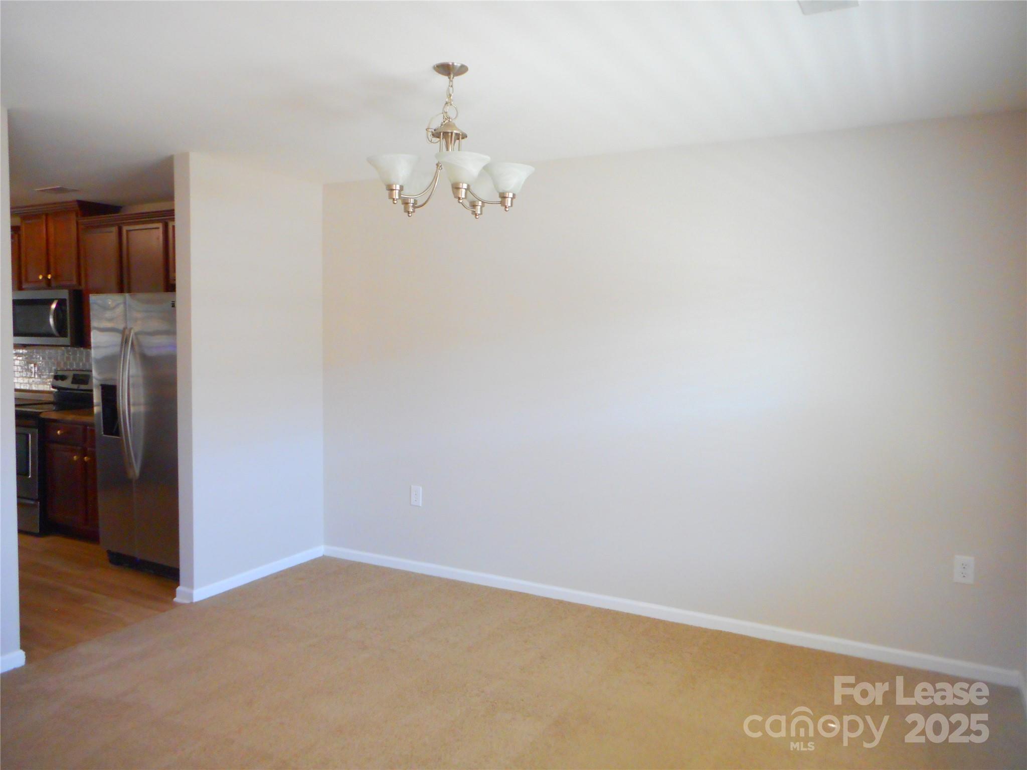 1004 Marcus Street Indian Land, SC 29707 - Photo 8 of 26 a view of a room with an empty space