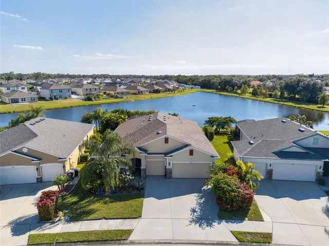 an aerial view of a house with garden space and outdoor space