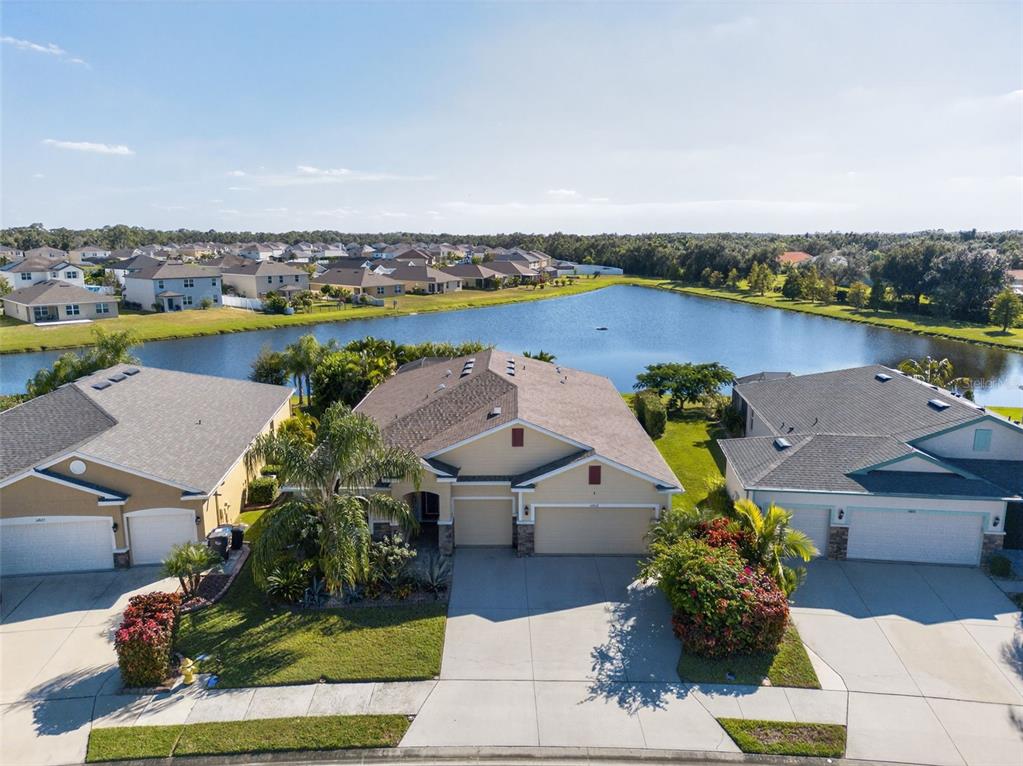 14818 Trinity Fall Way Bradenton, FL 34212 - Photo 1 of 1 an aerial view of a house with garden space and outdoor space