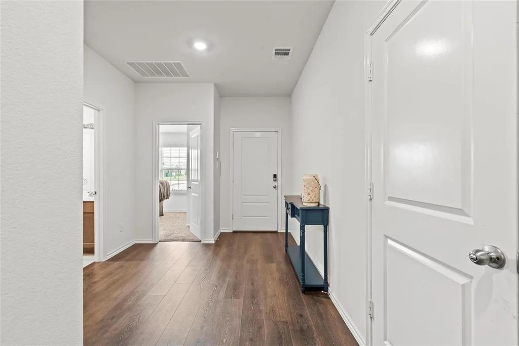 171 Seabiscuit Road Caddo Mills, TX 75135 - Photo 19 of 19 a view of hallway with wooden floor