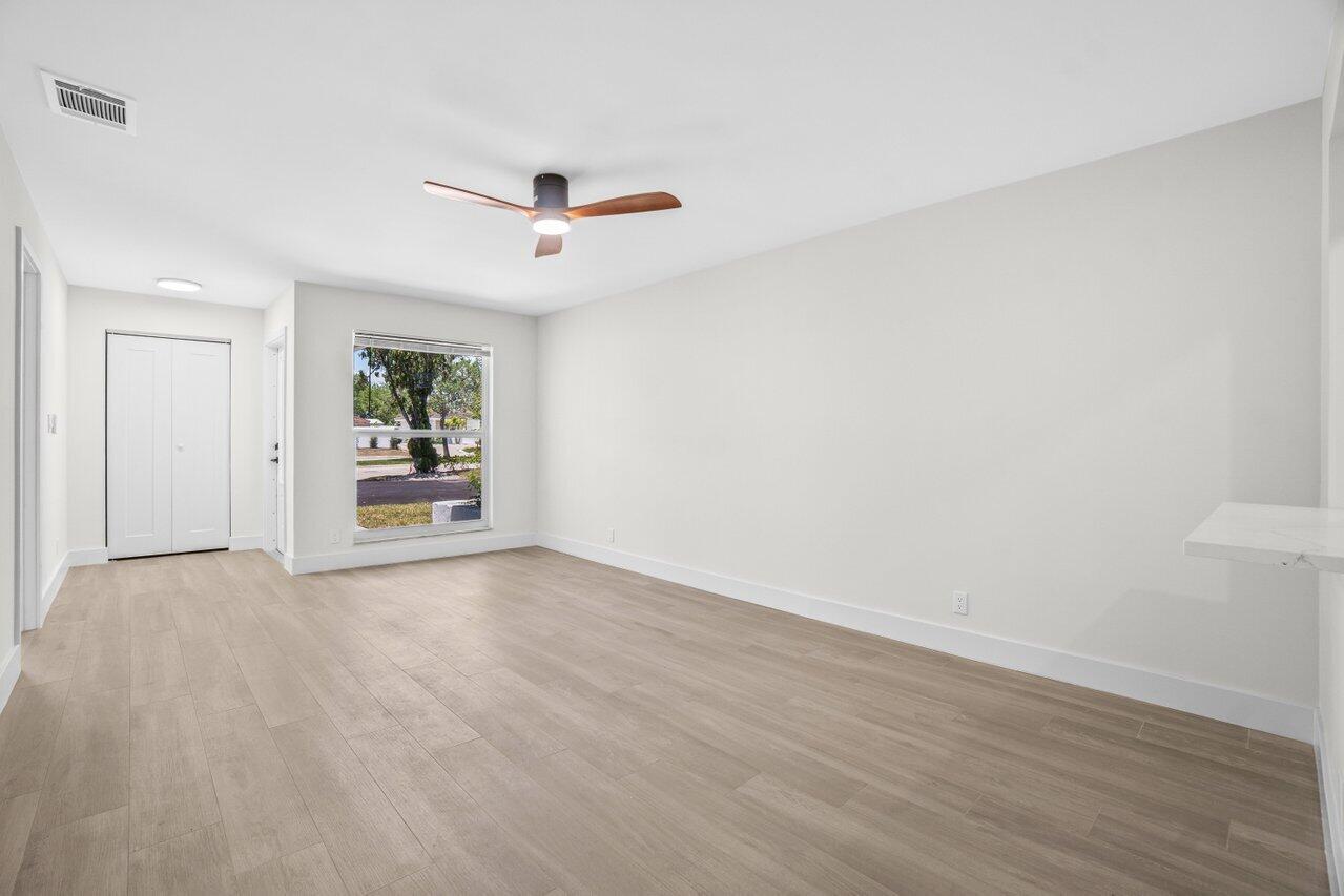 4498 Northwest 2nd Avenue Boca Raton, FL 33431 - Photo 24 of 43 a view of an empty room with a window
