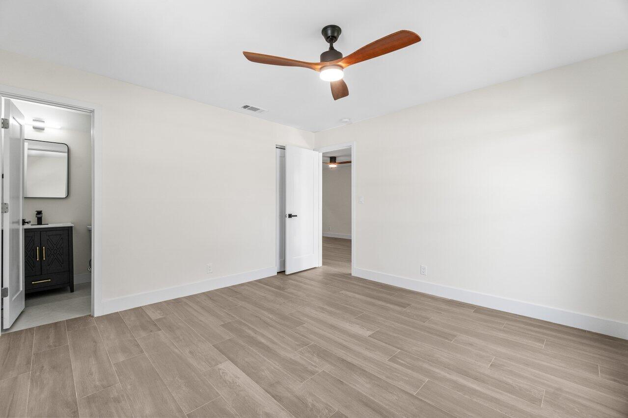 4498 Northwest 2nd Avenue Boca Raton, FL 33431 - Photo 29 of 43 wooden floor in an empty room