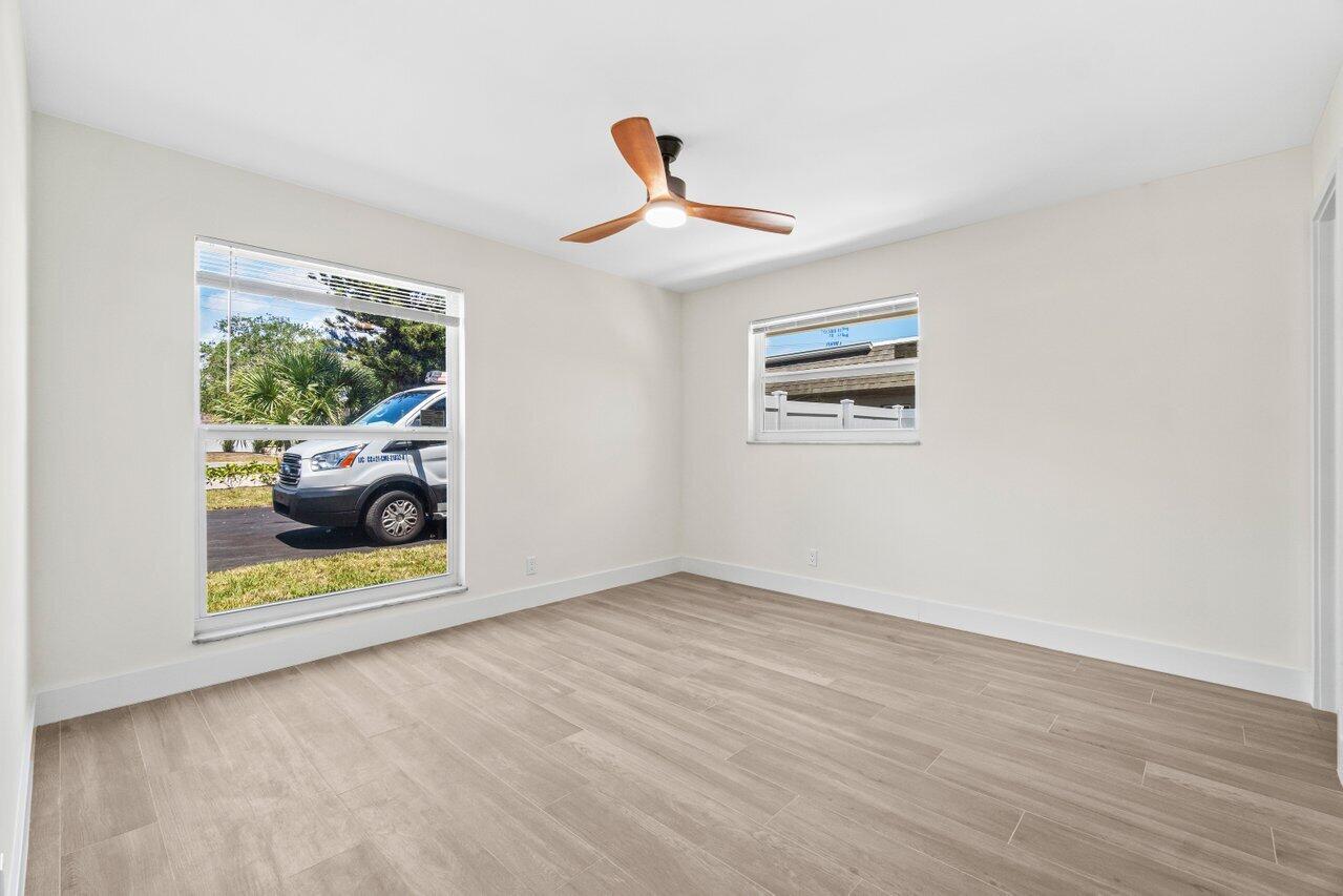 4498 Northwest 2nd Avenue Boca Raton, FL 33431 - Photo 30 of 43 a view of entryway with wooden floor